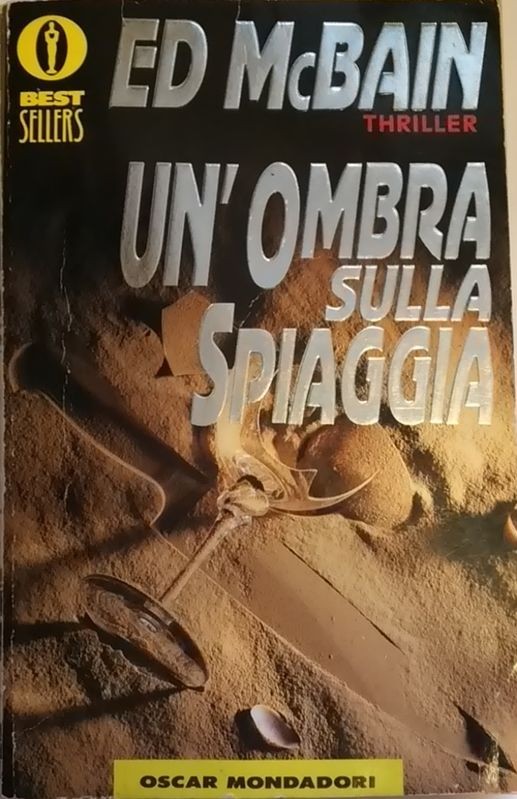 Un'ombra sulla spiaggia