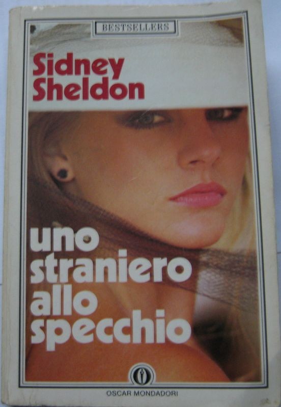 Uno straniero allo specchio,Sidney Sheldon,Oscar Mondadori su licenza