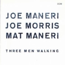 Three Men walking  MANERI JOE